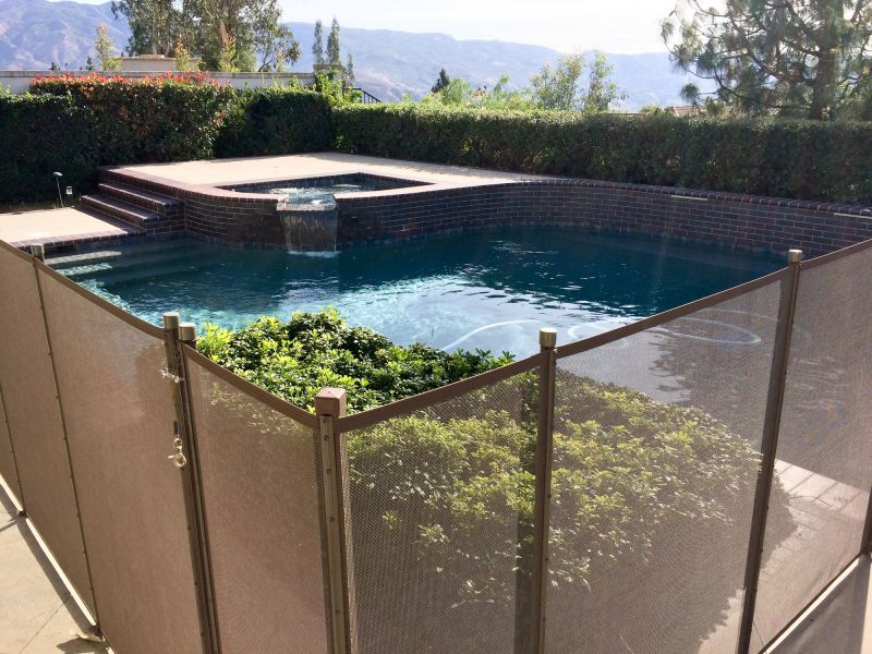 Mesh Pool Fence in Residential Setting