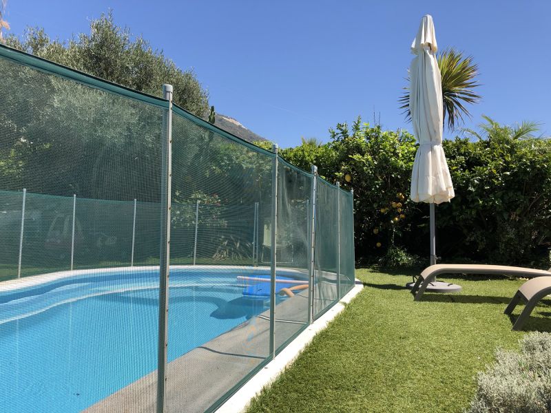 Pool Area with Mesh Safety Fence